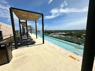 Departamento Amueblado en Renta de 1 Recámara con Rooftop e Infinity Pool | Ummbal (Av. Huayacán / Prolongación La Luna) — foto 12